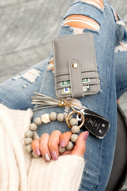 Gray Leopard Beaded Key Ring Wallet Bracelet - Stylish accessory with unique laser cut leopard beads, offering on-trend style and wallet functionality.