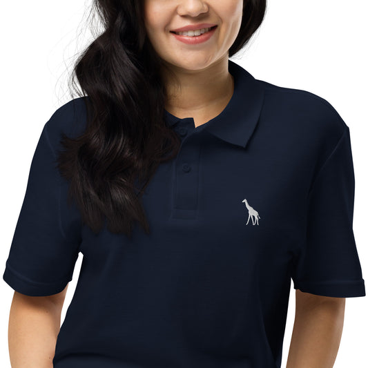 Person wearing a navy blue polo shirt with a giraffe logo on a white background
